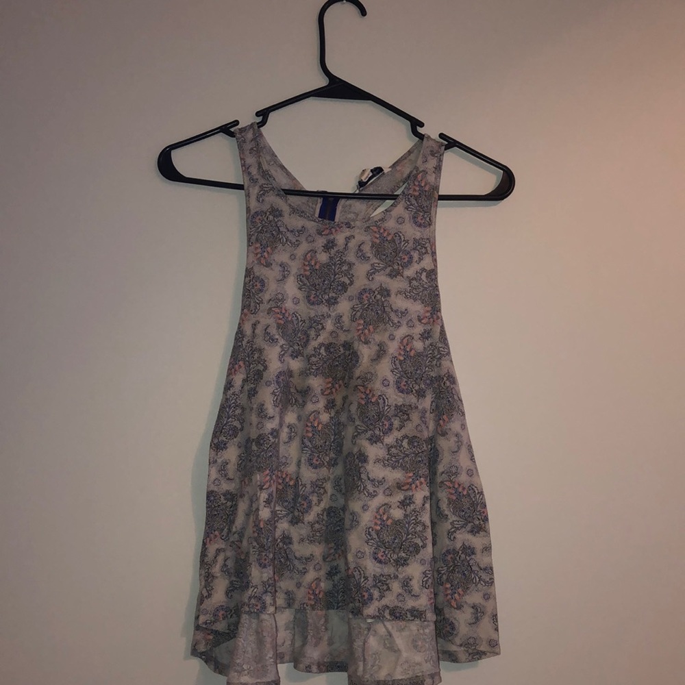 Floral print racer back tank top.